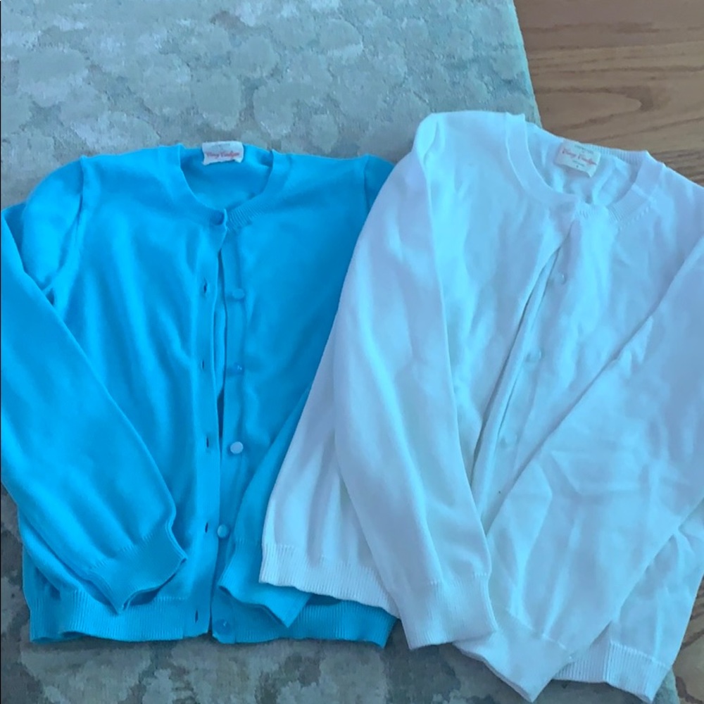 Two button up sweaters